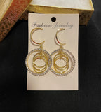 Gold and rhinestone earrings